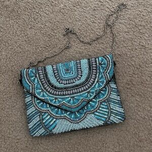 Hand beaded clutch in turquoise blue